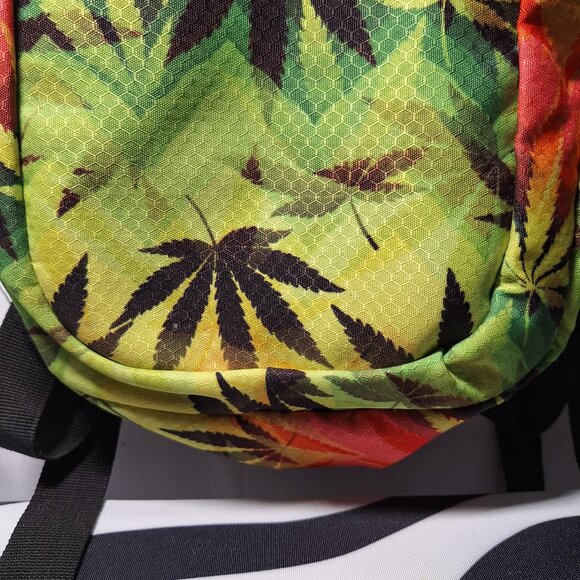 Vibedration Hydration Backpack w/o bladder - green, orange, black leaves… - Picture 12 of 16